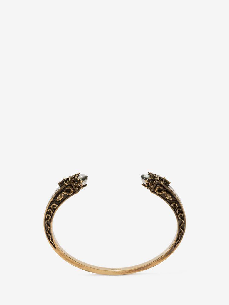 Alexander Mcqueen Twin Skull Engraved Bracelet In Antique Gold ModeSens