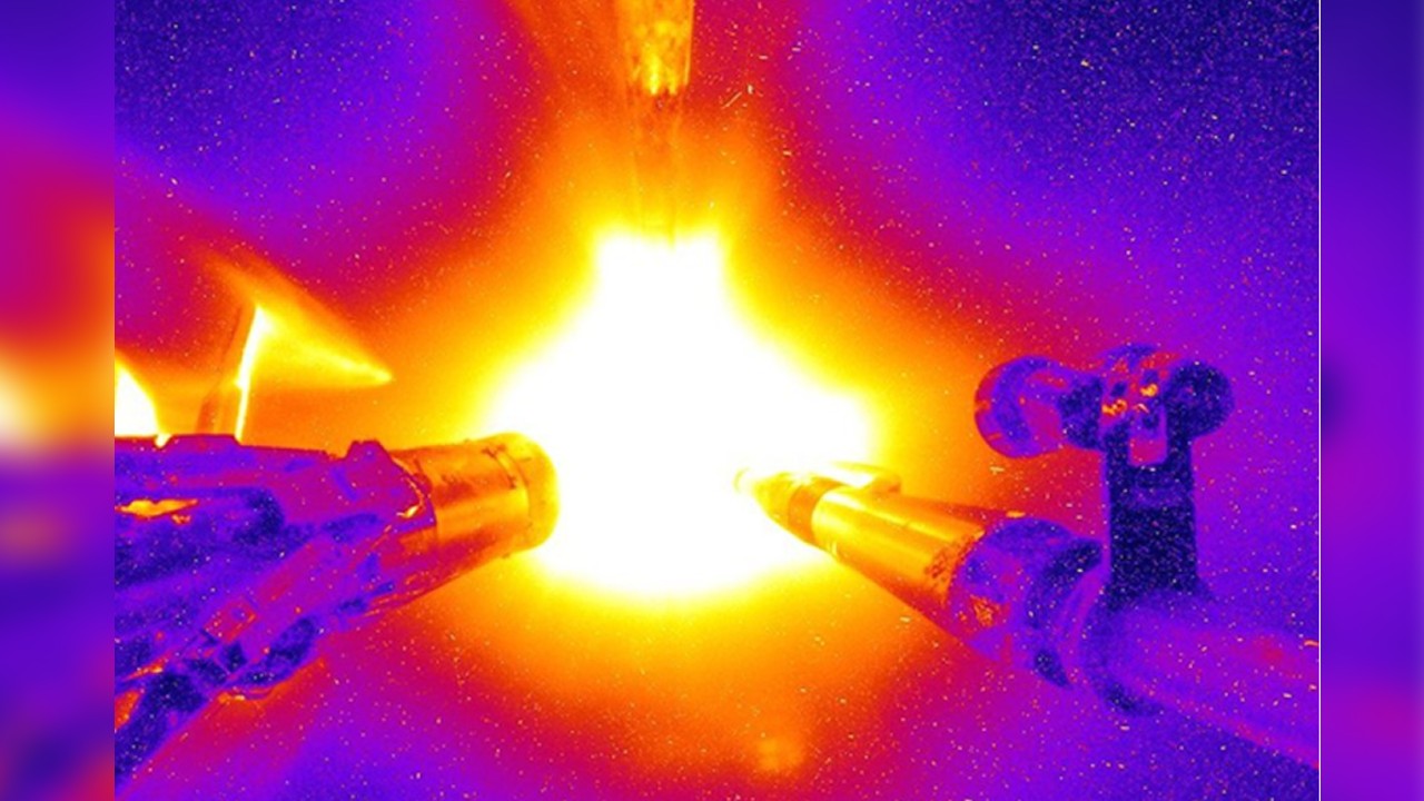 A laser-induced fusion reaction taking place inside the world�s biggest laser at the National Ignition Facility�s target chamber.
