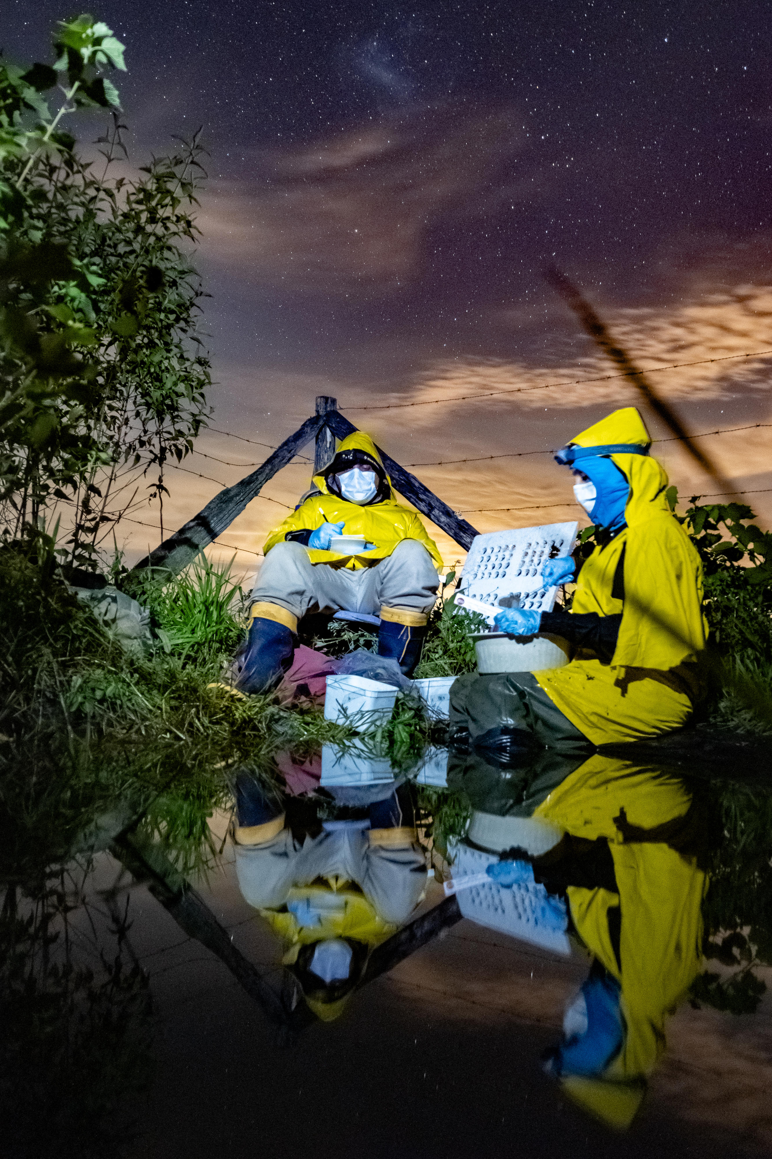 Researchers perform fieldwork during thunderstorms in the COVID-19 pandemic.