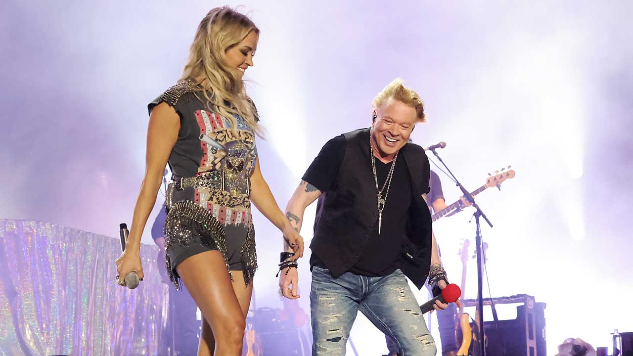 Watch Axl Rose join Carrie Underwood onstage for two Guns N' Roses