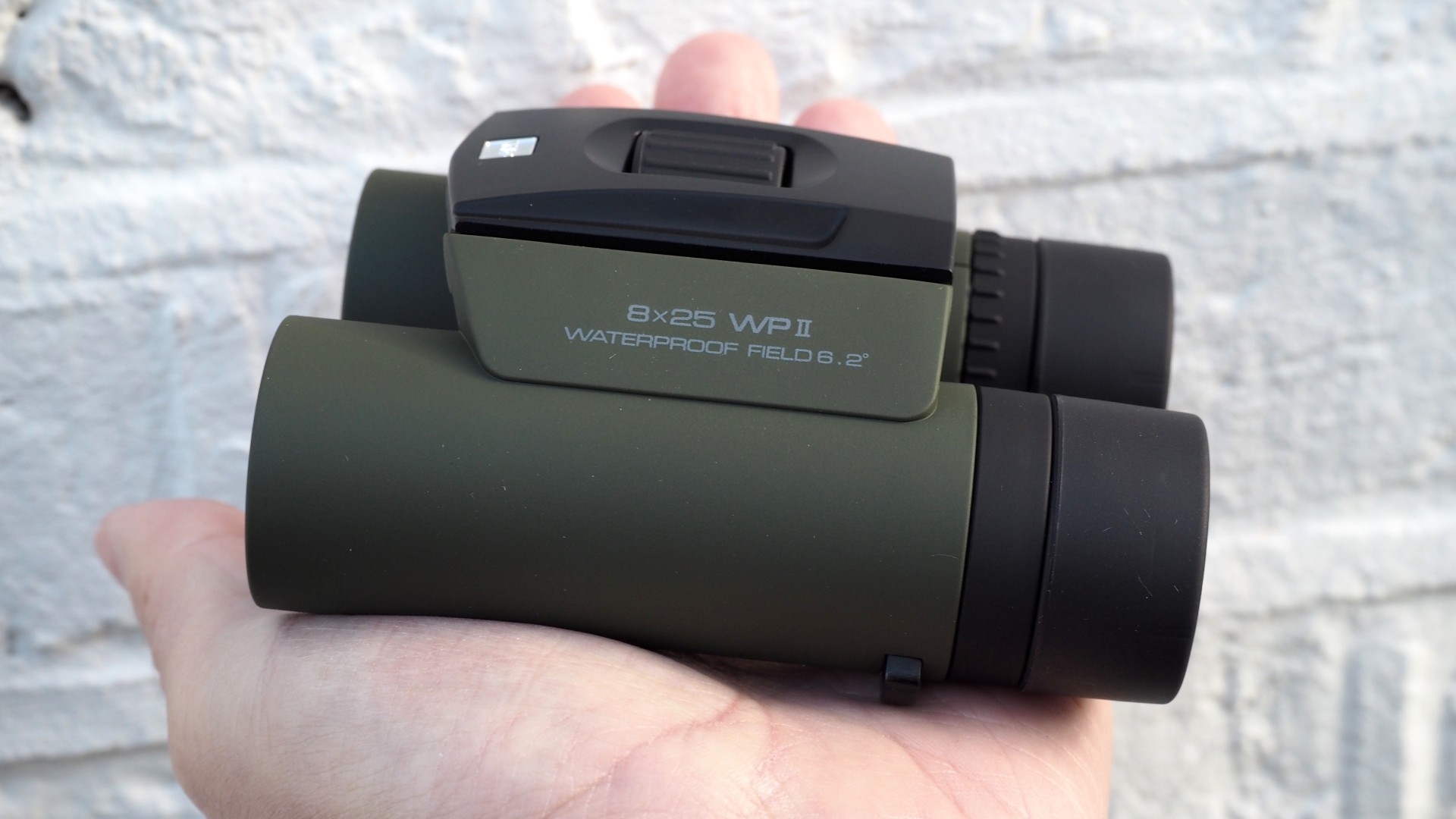 Close up photo of the Olympus 8x25 WP II binoculars