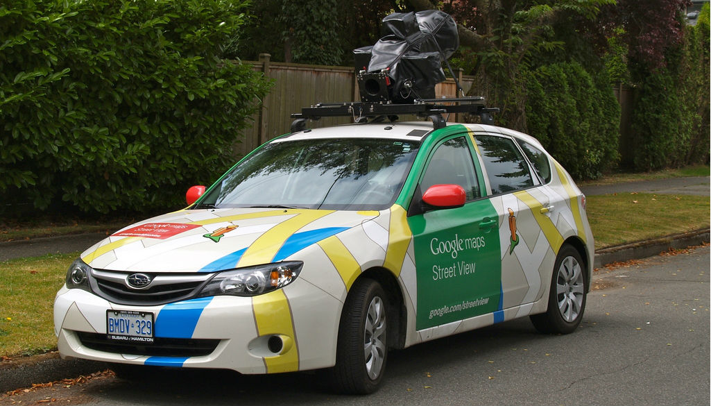 Google Street View car sandwiched by two buses and a truck in Indonesia