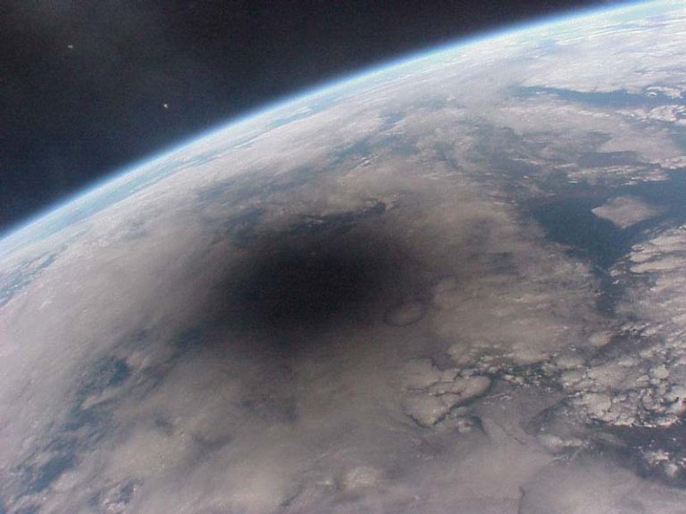 During a solar eclipse, the shadow of the moon moves across Earth’s surface at nearly 2,000 kilometers per hour as the eclipse unfolds. This picture of the Aug. 11, 1999, solar eclipse was one of the last ever taken from the Russian Mir space station.