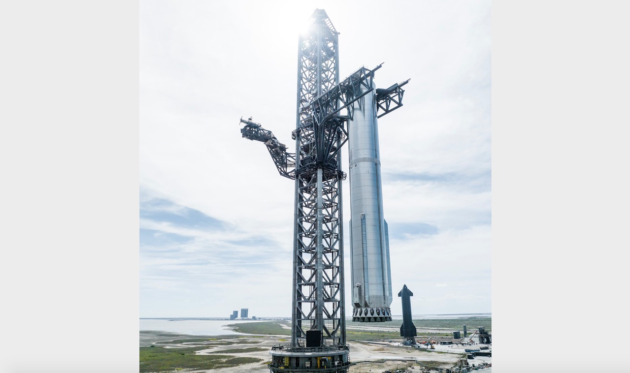 SpaceX lifts 33engine Starship Super Heavy booster onto launch pad