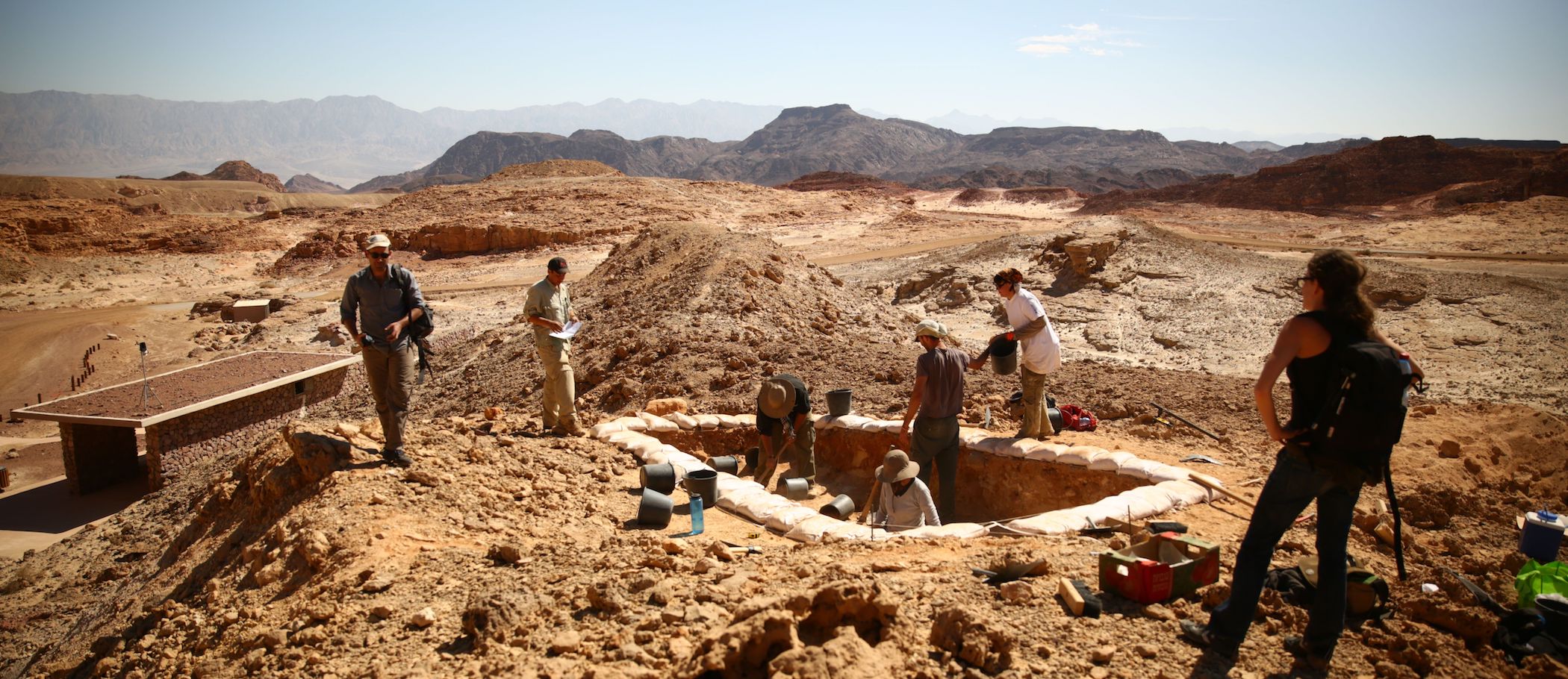 Archaeologists excavate a copper production site dubbed &quot;Slaves� Hill&quot; in the Timna Valley, Israel. This 10th Century B.C. site yielded layers of slag that helped reconstruct a history of technological change in the region.