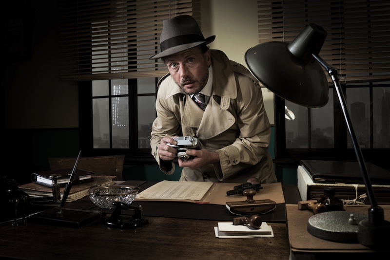 retro spy photographing documents