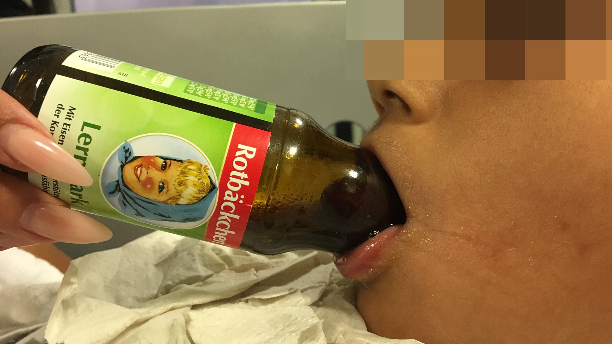 The boy had been drinking from a juice bottle when his tongue suddenly became stuck in the bottle&rsquo;s neck.