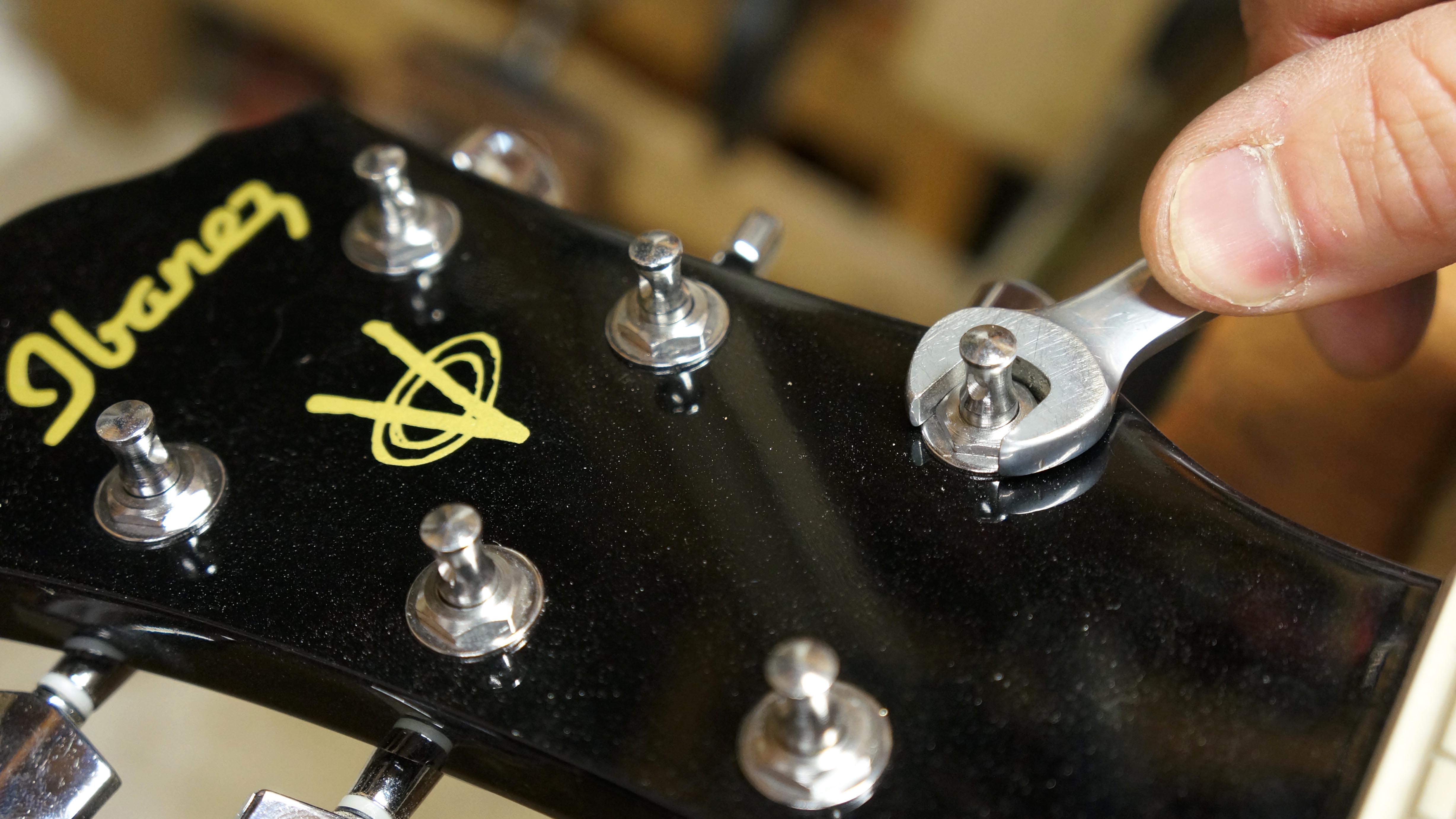 How to adjust acoustic guitar action, lower your strings and set up