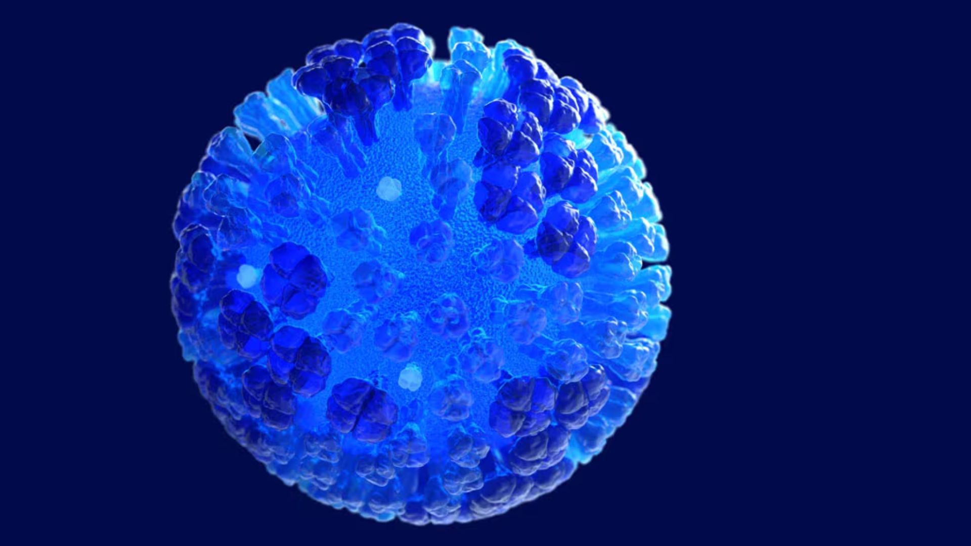 An illustration of a spherical flu virus particle depicted in different shades of blue