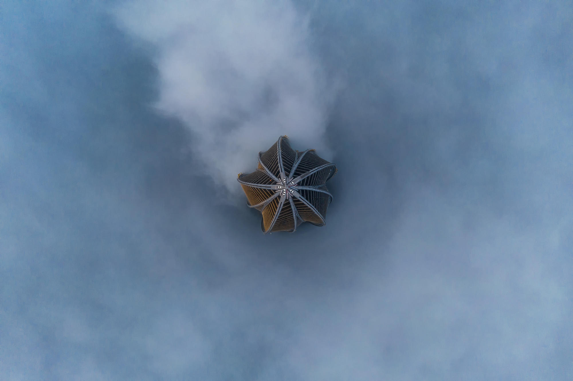 On a foggy day in Saint-Petersburg, photographer Yuriy Stolypin arrived at the Lakhta Center (Europe’s largest skyscraper) and sent a drone high into the air. Stolypin writes: “I wanted to take a photo of the tallest skyscraper in Europe, shrouded in morning fog. I regularly monitored the weather and looked into the city cameras to make sure that all shooting conditions were favorable for the intended shot, since I live very far from the shooting location. When everything coincided, early in the morning I called a taxi, arrived at the skyscraper, raised the drone as high as possible and took this picture.