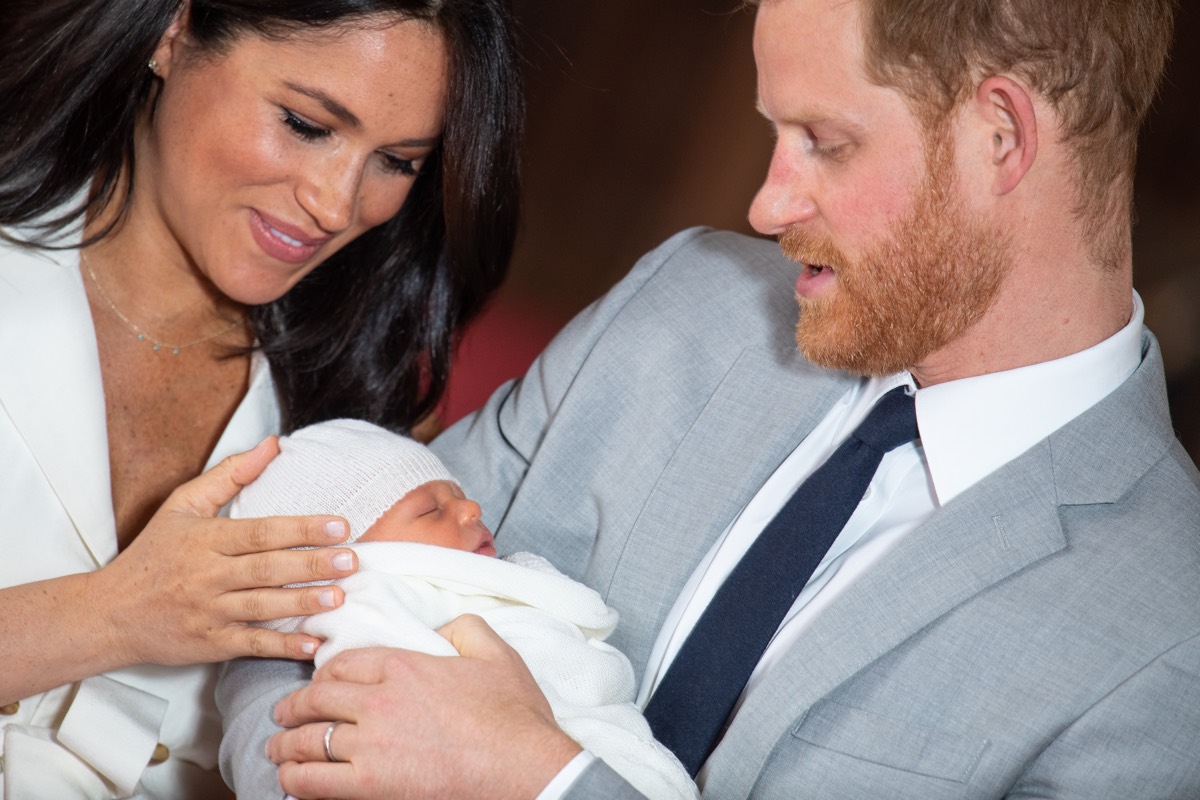 Prince Harry, Duke of Sussex, and Meghan, Duchess of Sussex, pose with their newborn son Prince Archie Harrison Mountbatten-Windsor in St George�s Hall at Windsor Castle on May 8, 2019, in Windsor, England.