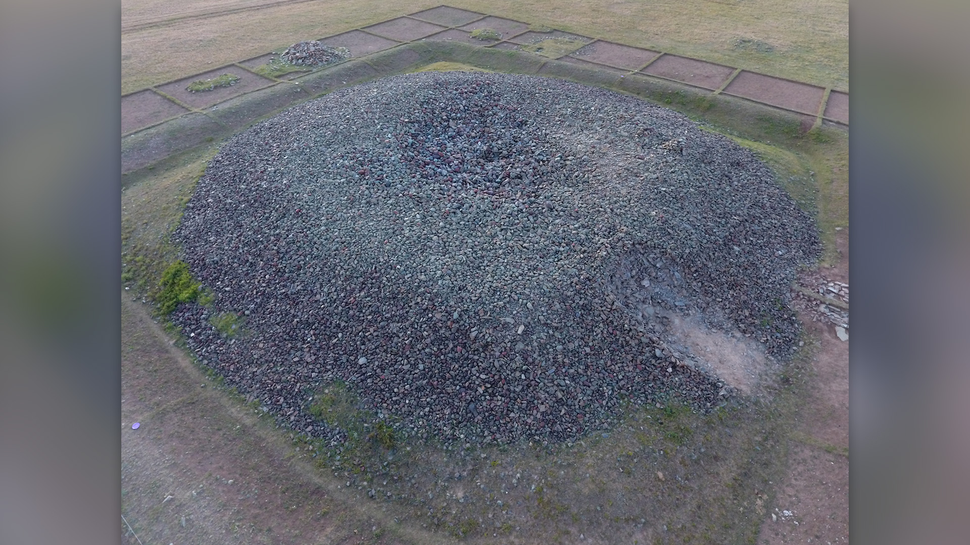 The tomb itself was a square-shaped pyramid about 165 feet on each side. It was built for a Göktürk prince who was cremated in its central chamber.