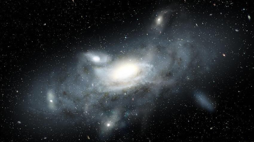 An artist�s impression of the Milky Way in its youth, surrounded by globular clusters.