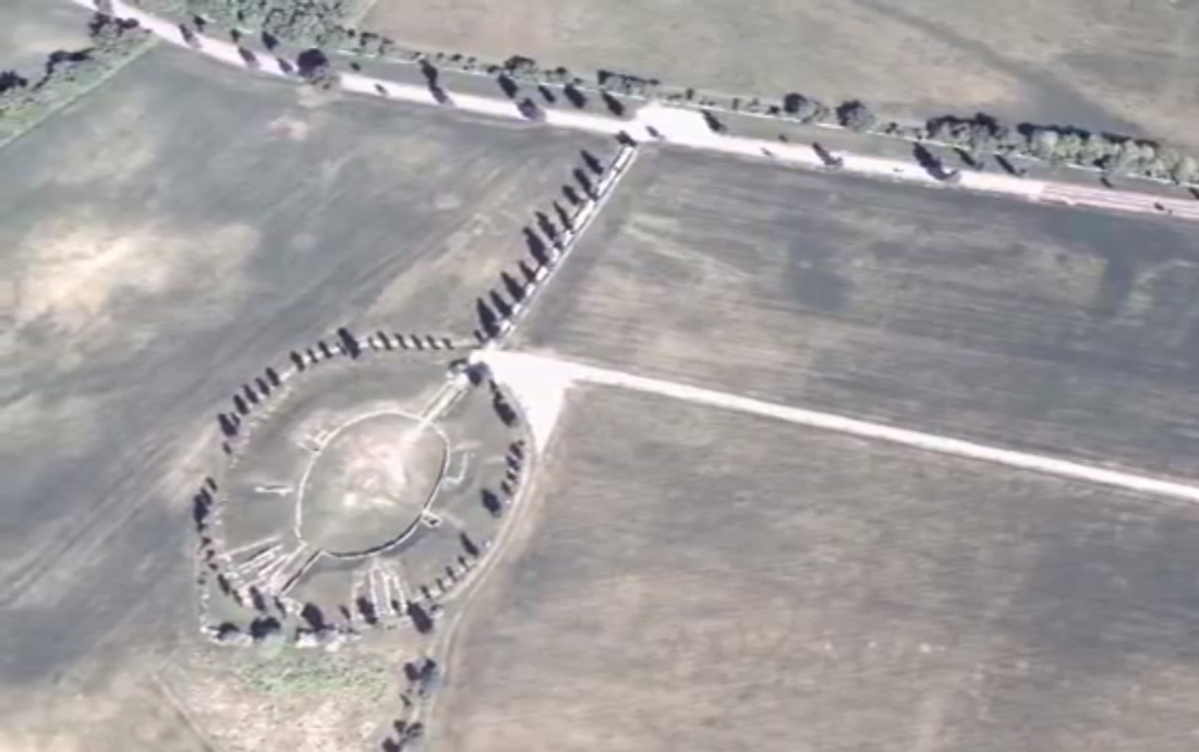 In this image of the civilian town of Carnuntum, the amphitheater and remains of the gladiator school are visible. To the north the street system and the main fortification of the municipium show up as faint vegetation marks in the grassland.