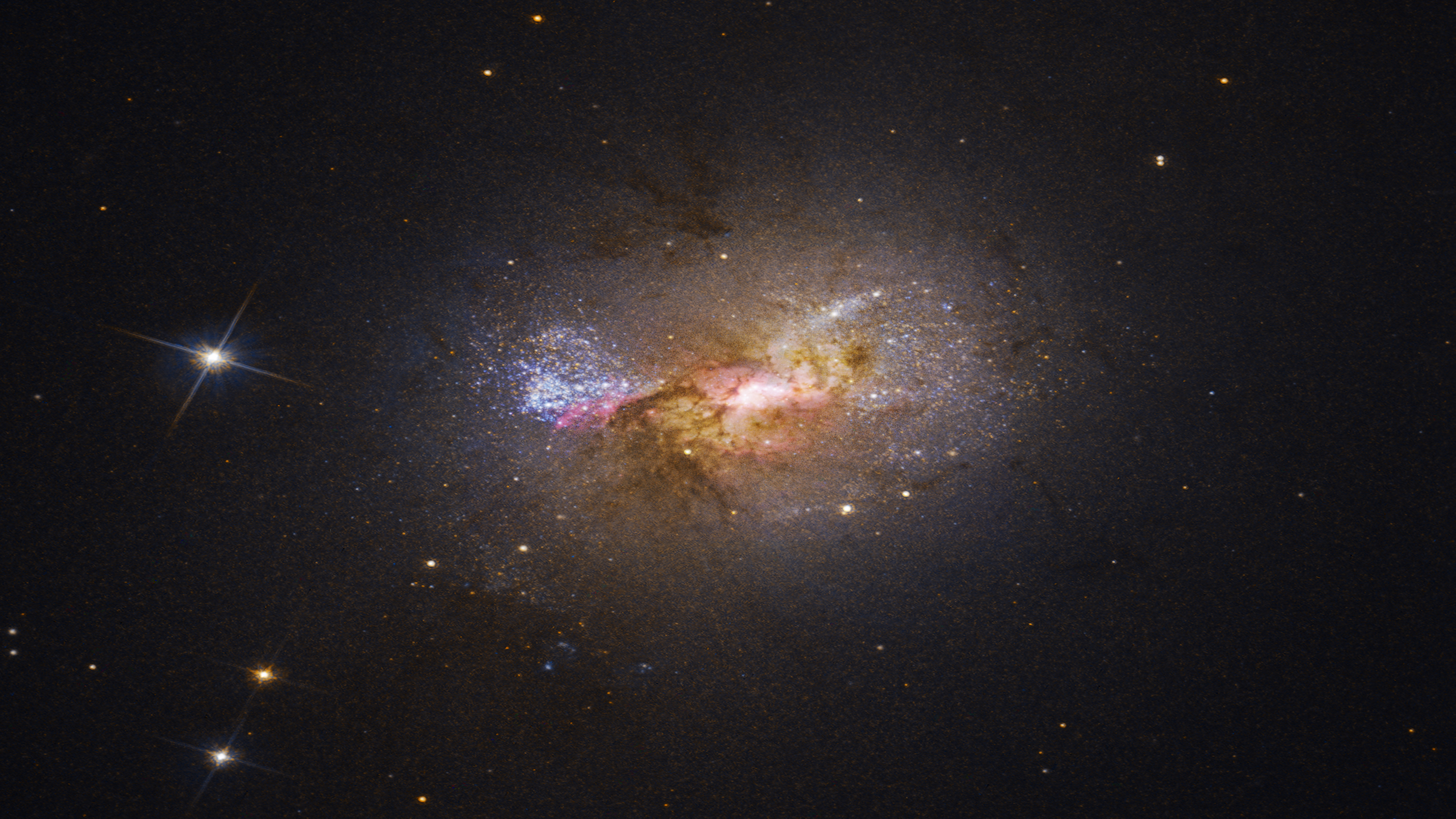 The black hole was spotted at the center of the dwarf galaxy Henize 2-10