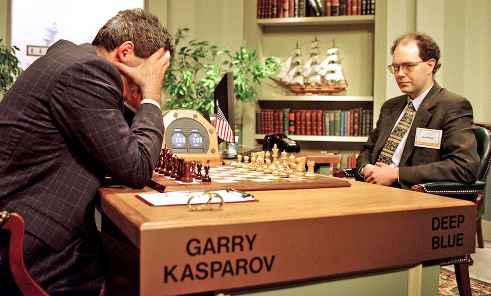 World Chess champion Garry Kasparov (left) ponders a chess move during the sixth and final game of his match with IBM�s Deep Blue computer on May 11, 1997.