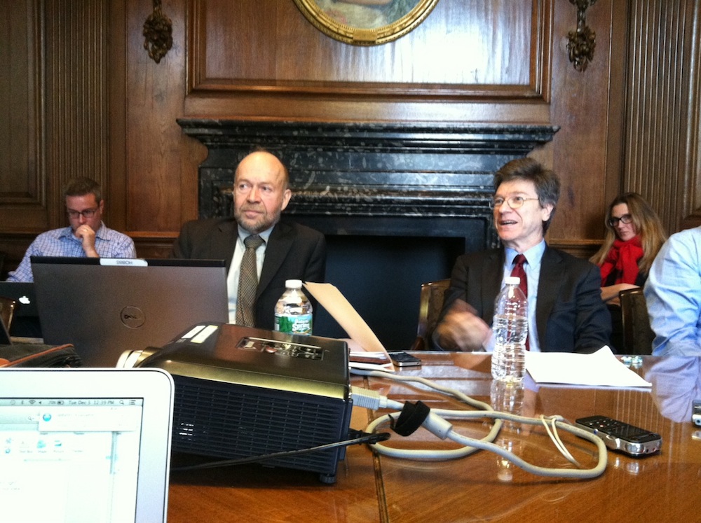 Climate scientists James Hansen (left) and economist Jeffrey Sachs discuss a new paper on limiting carbon dioxide emissions with reporters at Columbia University&rsquo;s Low Library on Dec. 3, 2013.