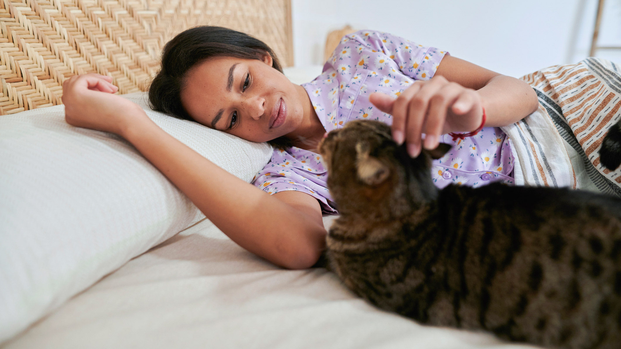 Letting your pet sleep in your bed with you might actually improve your