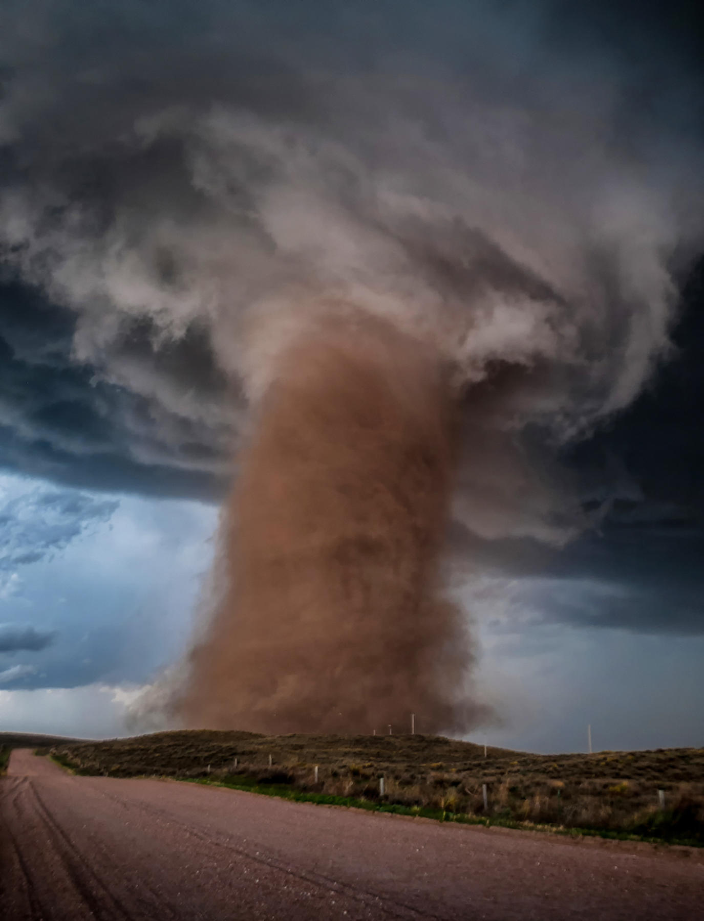 Photographer Tori Jane Ostberg writes: “An incredible EF2 tornado tears through a rural Colorado field after destroying a home. This tornado marked my very first day of my very first great plains storm chase adventure, and it was only a sign of the incredible things to come."