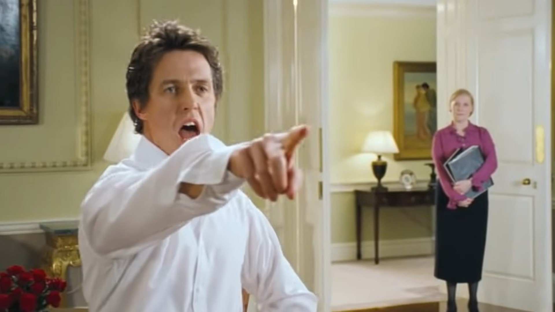 Hugh Grant can't understand why we all love his "excruciating" Love