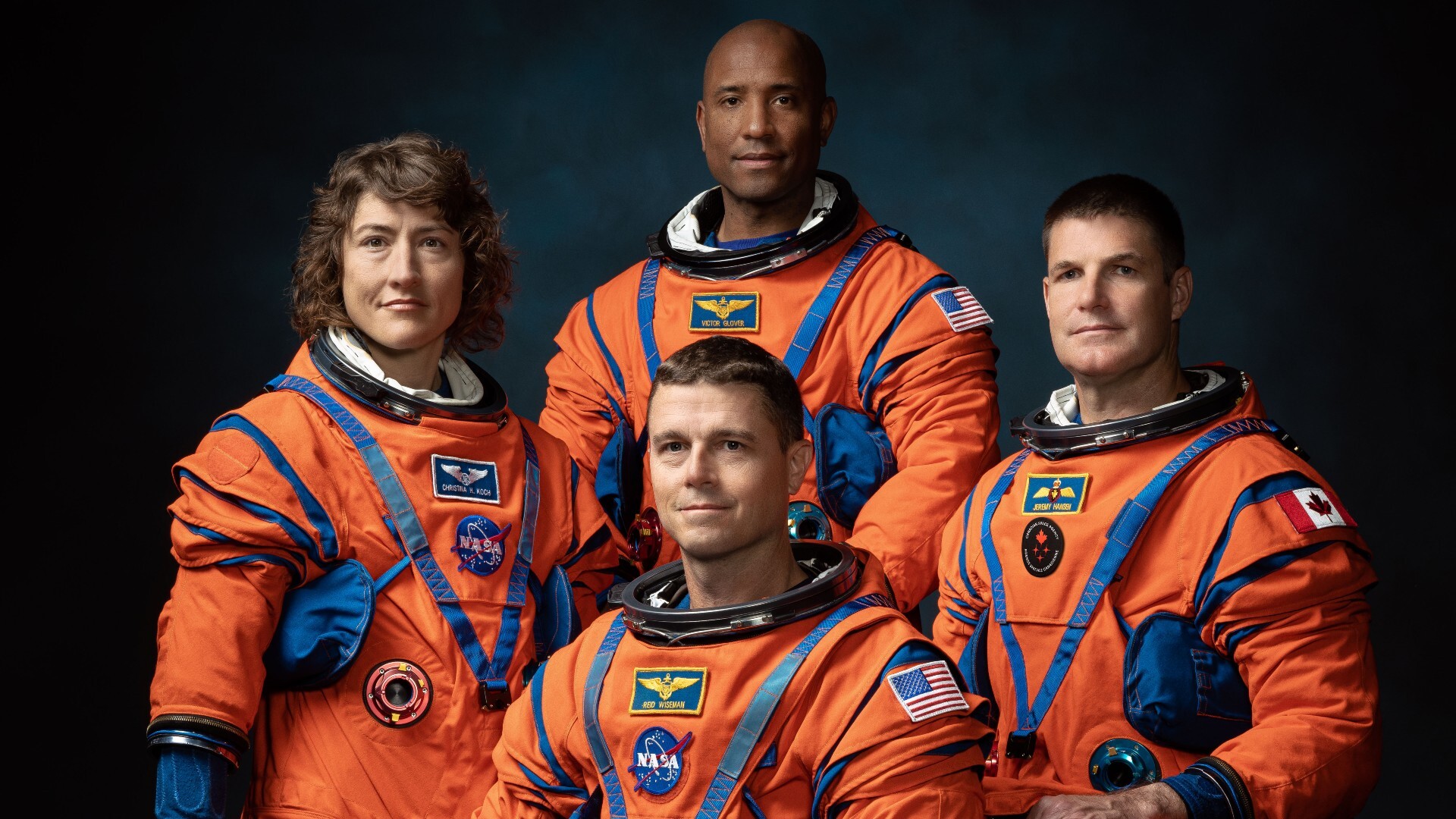 The crew of NASA’s Artemis II mission (left to right): NASA astronauts Christina Hammock Koch, Reid Wiseman (seated), Victor Glover, and Canadian Space Agency astronaut Jeremy Hansen.