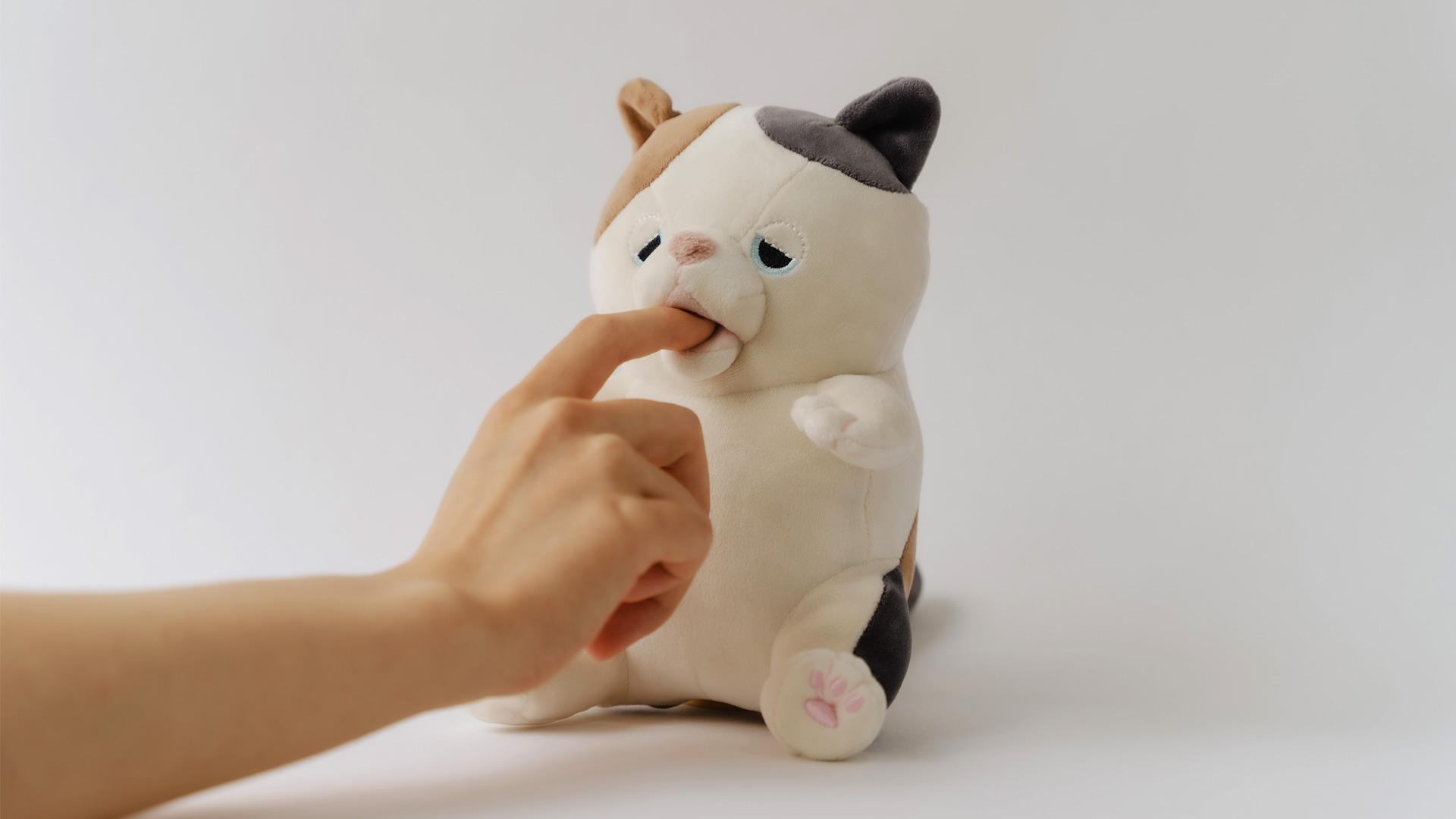 This adorable stuffed animal robot will nibble on your finger because