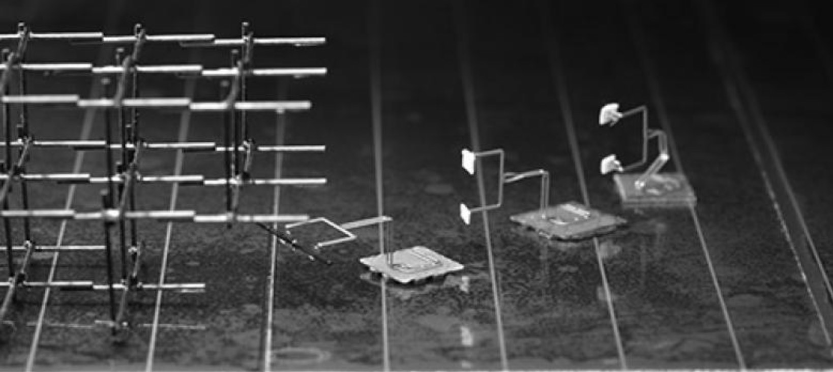 SRI International has created a tool shop for its mini robots that lets them tackle a wider variety of tasks.