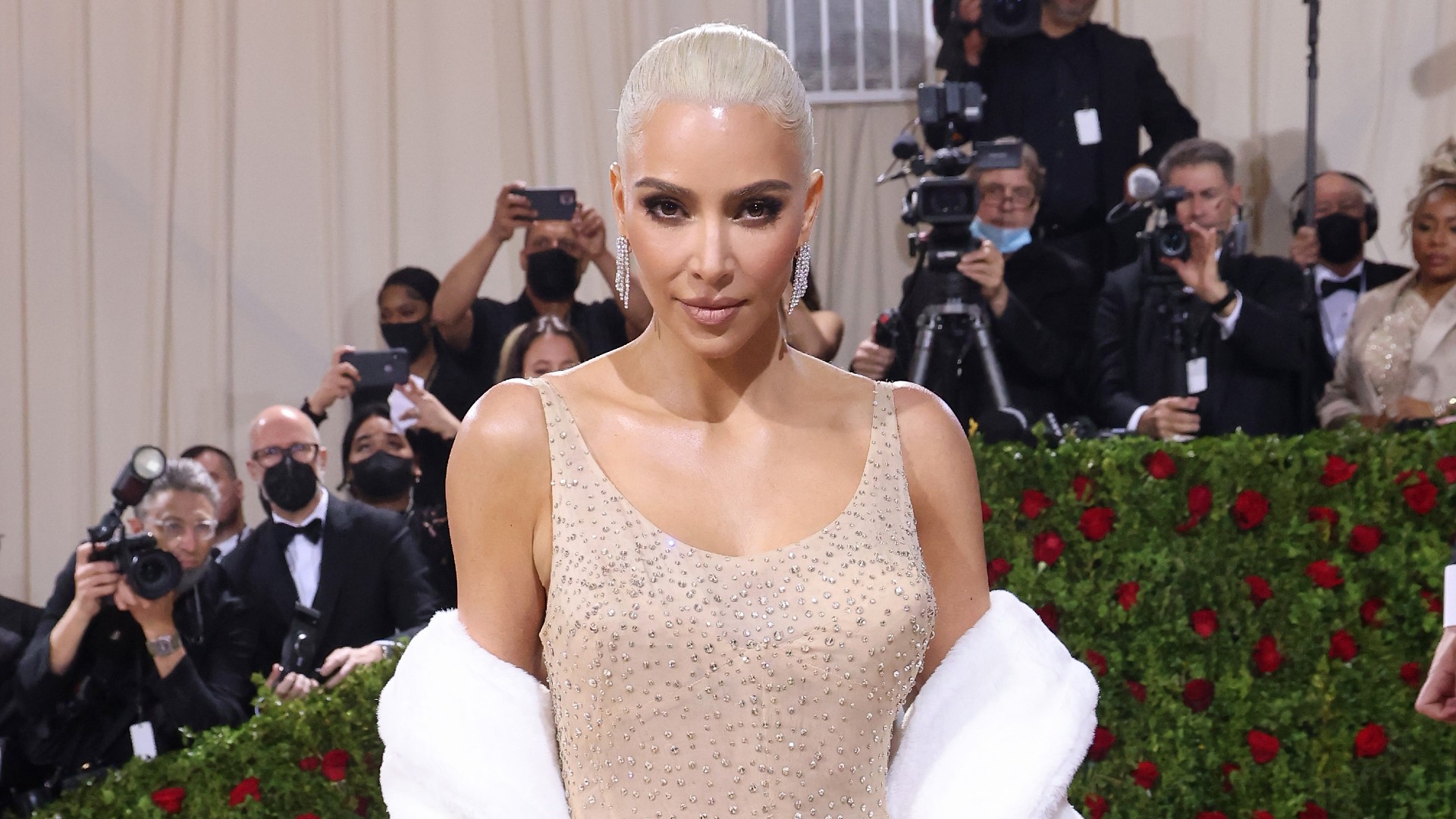 Kim Kardashian opts for a naked pantsuit look | Woman & Home