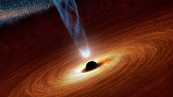 Artist&rsquo;s illustration of a supermassive black hole emitting a jet of energetic particles. Such black holes are also strong emitters of X-ray light, which is apparently reflected off gas and dust in the surrounding accretion disk..