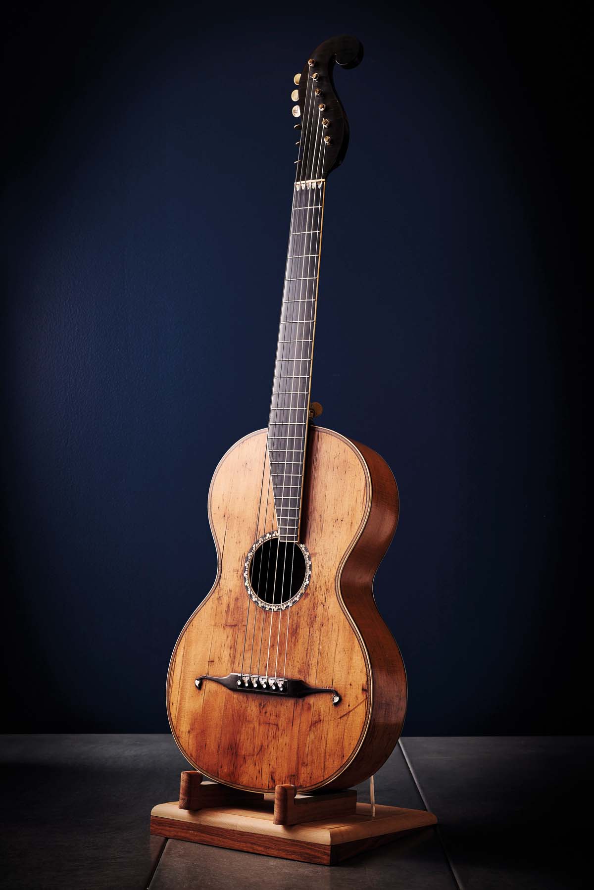 The history of Martin's earliest acoustic guitar designs, from the