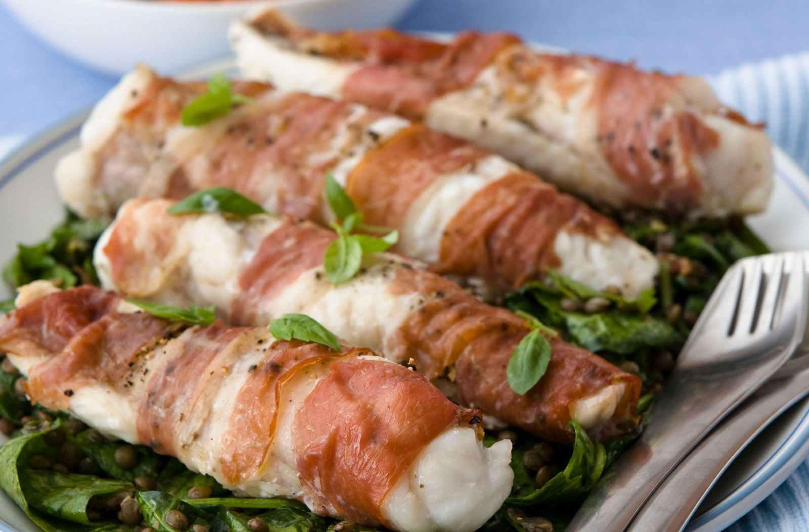 Prosciuttowrapped monkfish with warm lentil salad Recipes GoodtoKnow