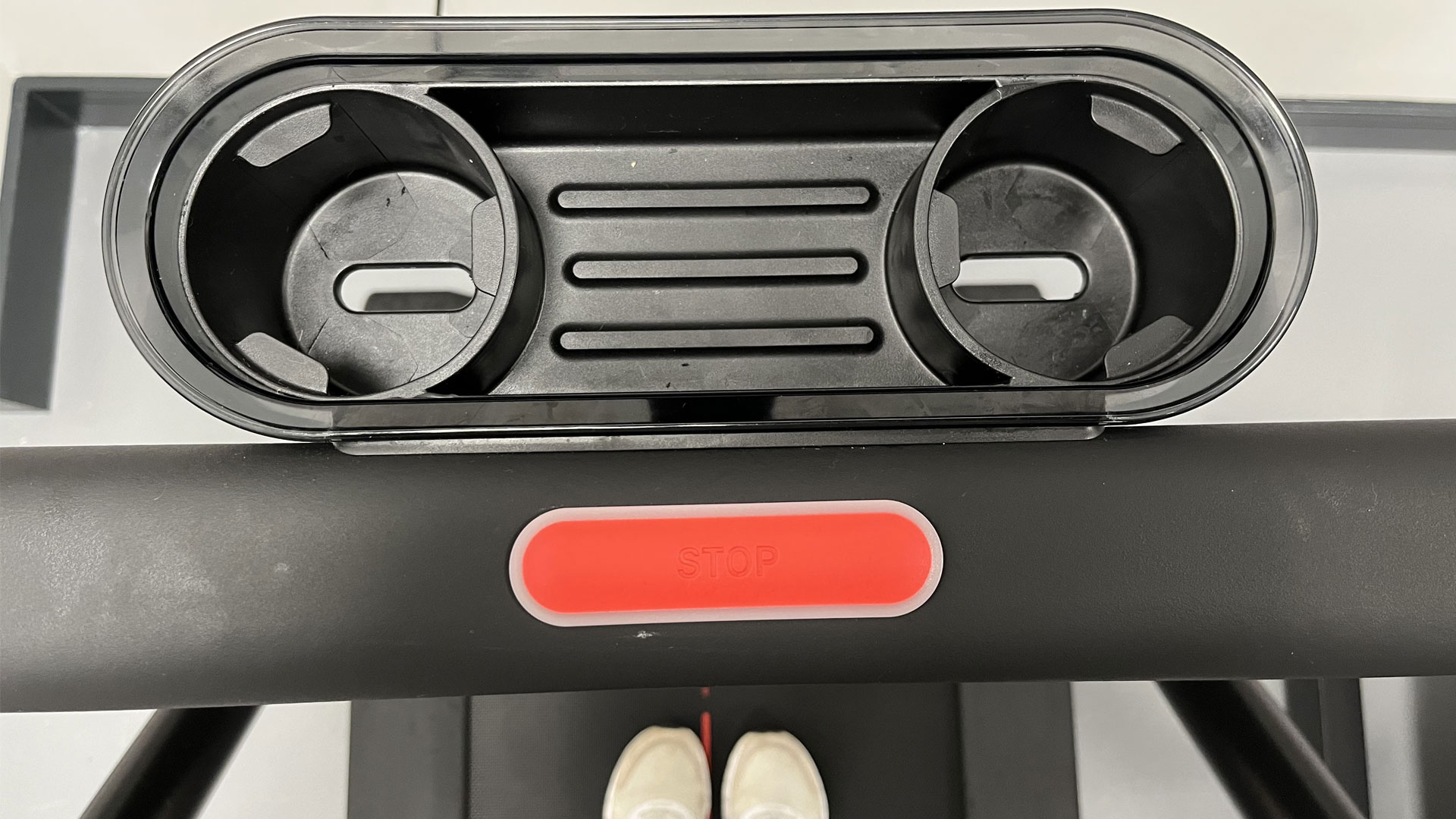 Image shows the bottle holder on the Peloton Tread.