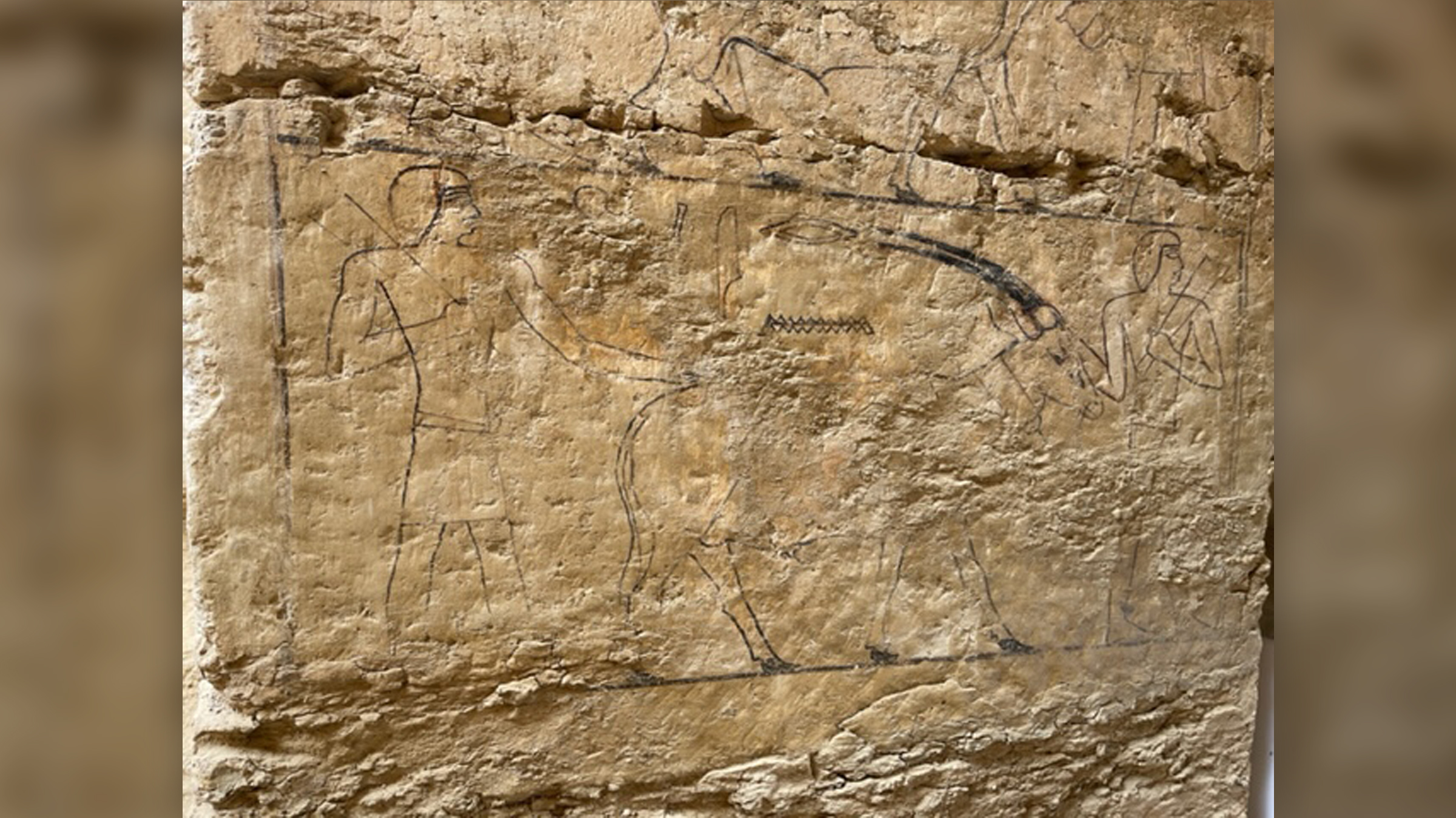 A fragment of painted decoration shows two men and at least one oryx.