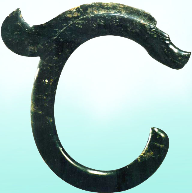 A C-shaped jade dragon artifact from the Hongshan culture.