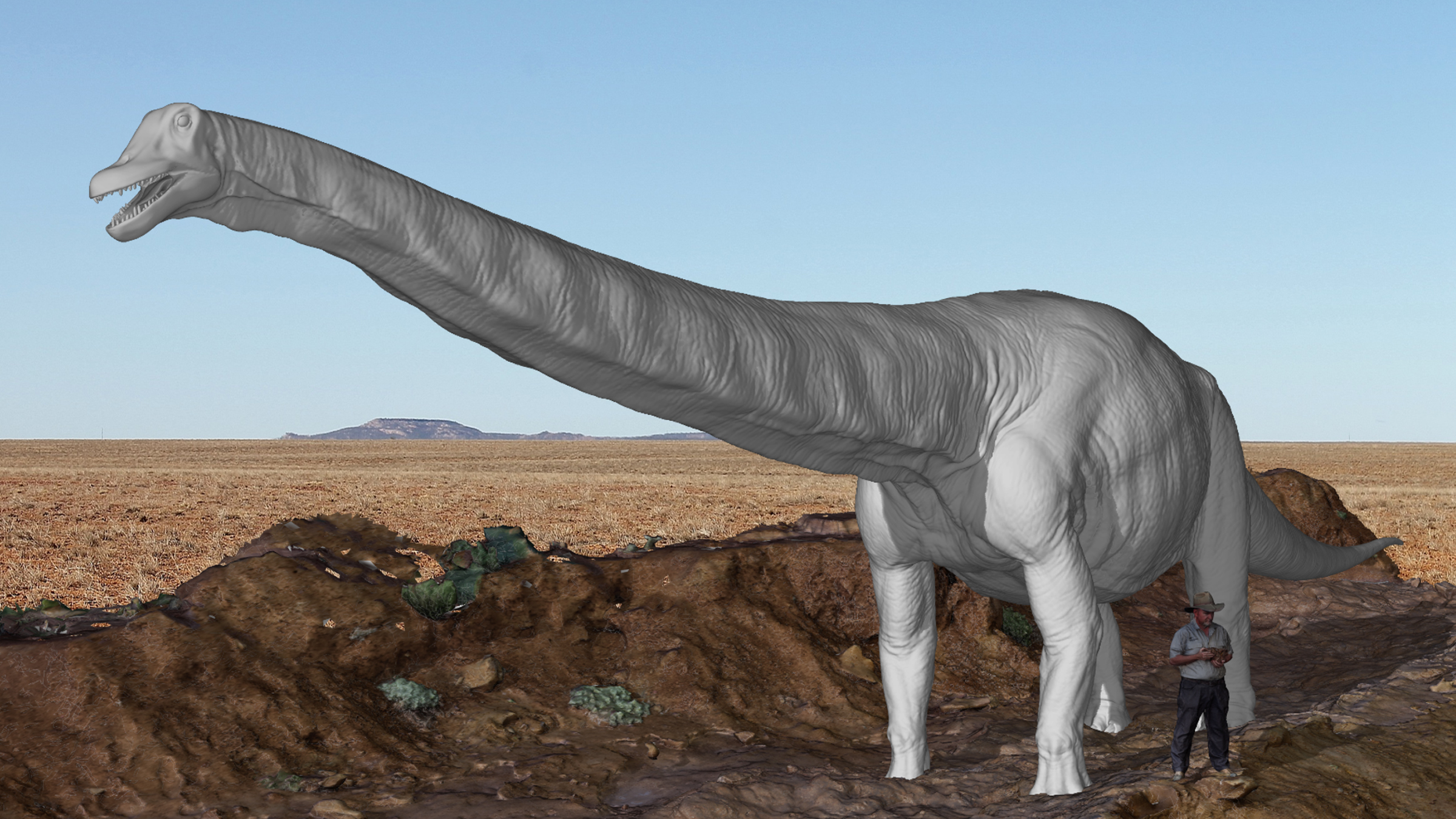 A virtual reconstruction of Cooper standing next on the dinosaur highway, with a human for scale.