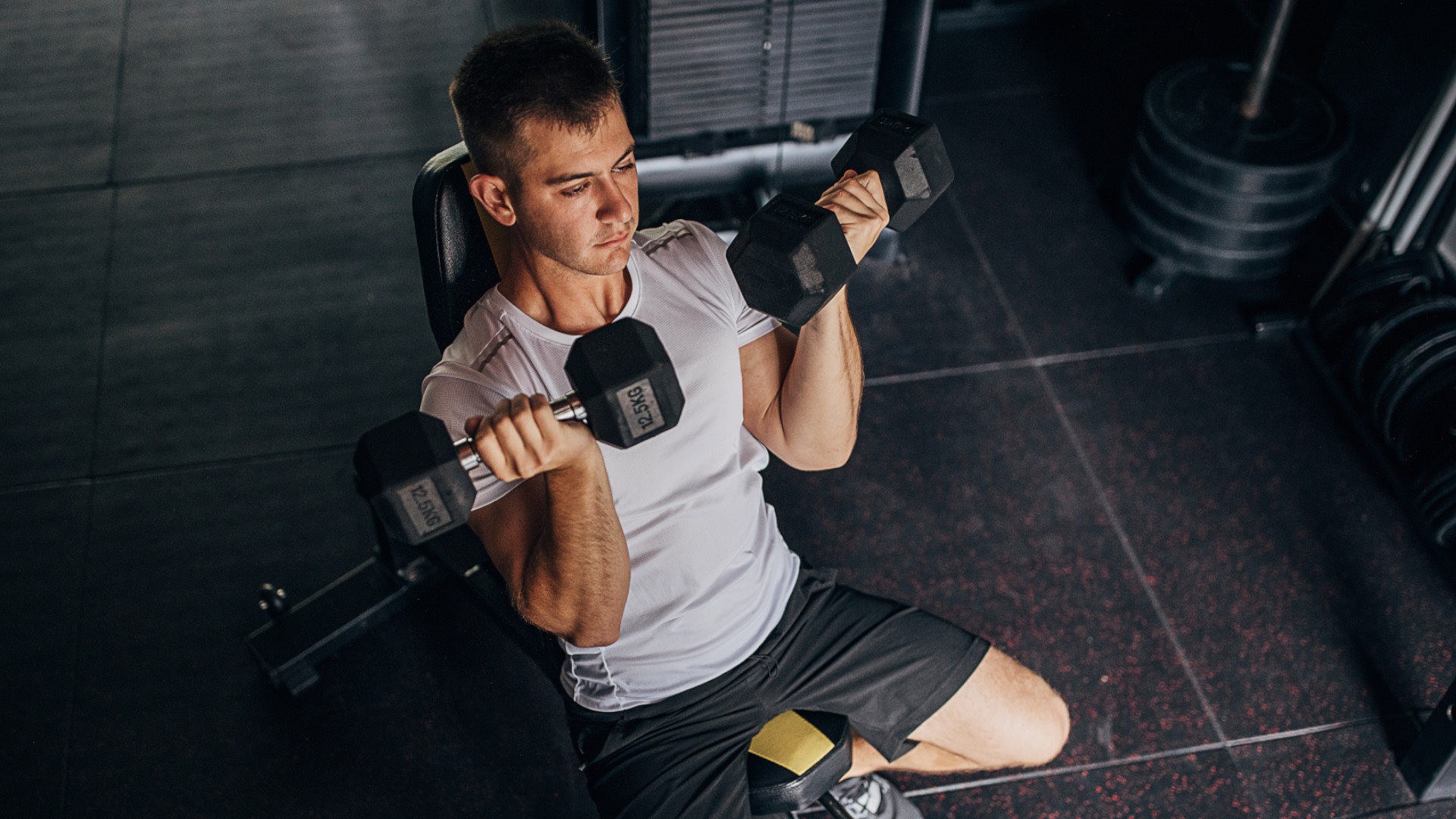 Two dumbbells and these five beginner exercises to build arm and chest