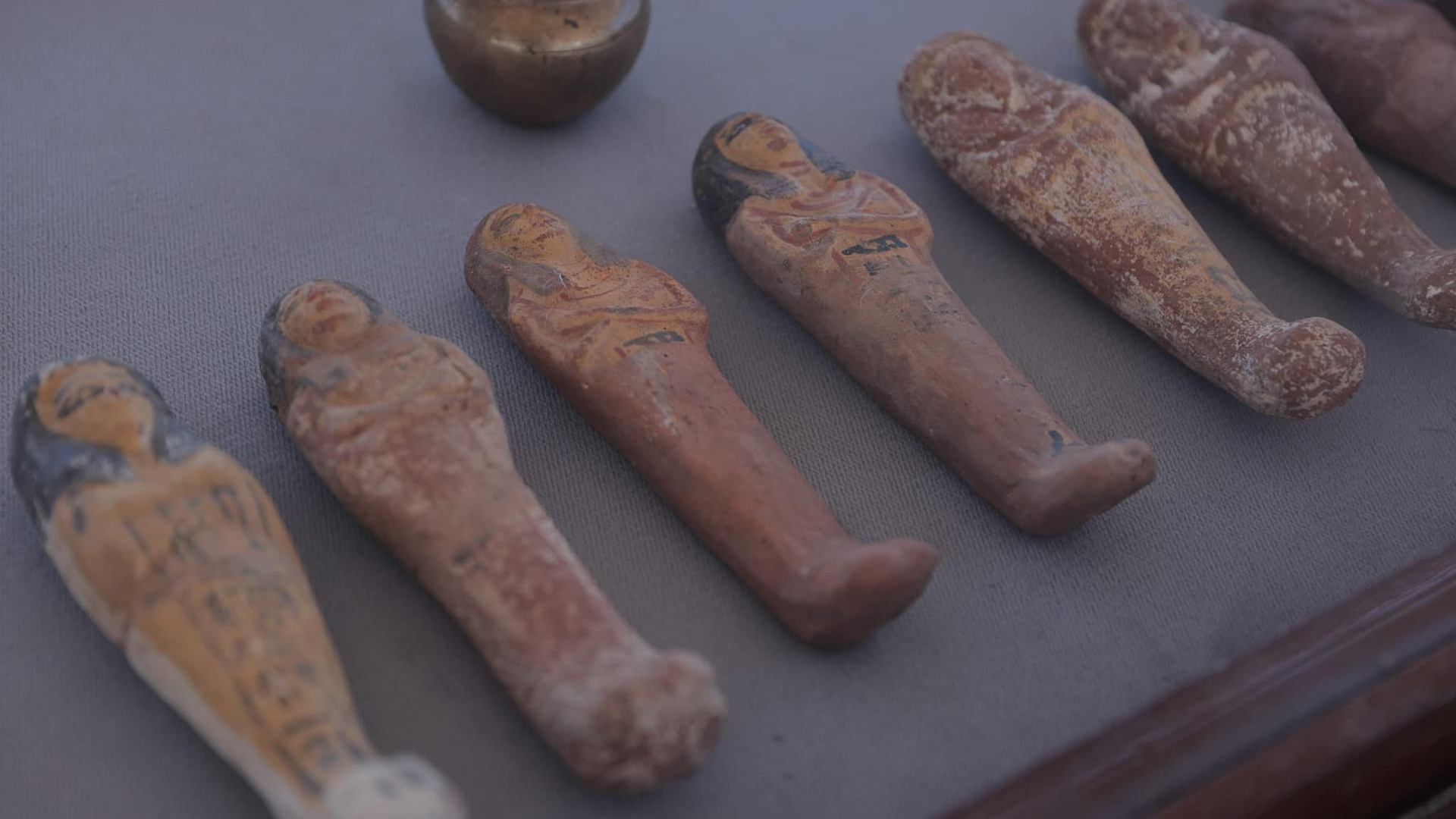 Shabti (also called Ushabti) figurines were buried with the deceased and were intended to serve them in the afterlife.