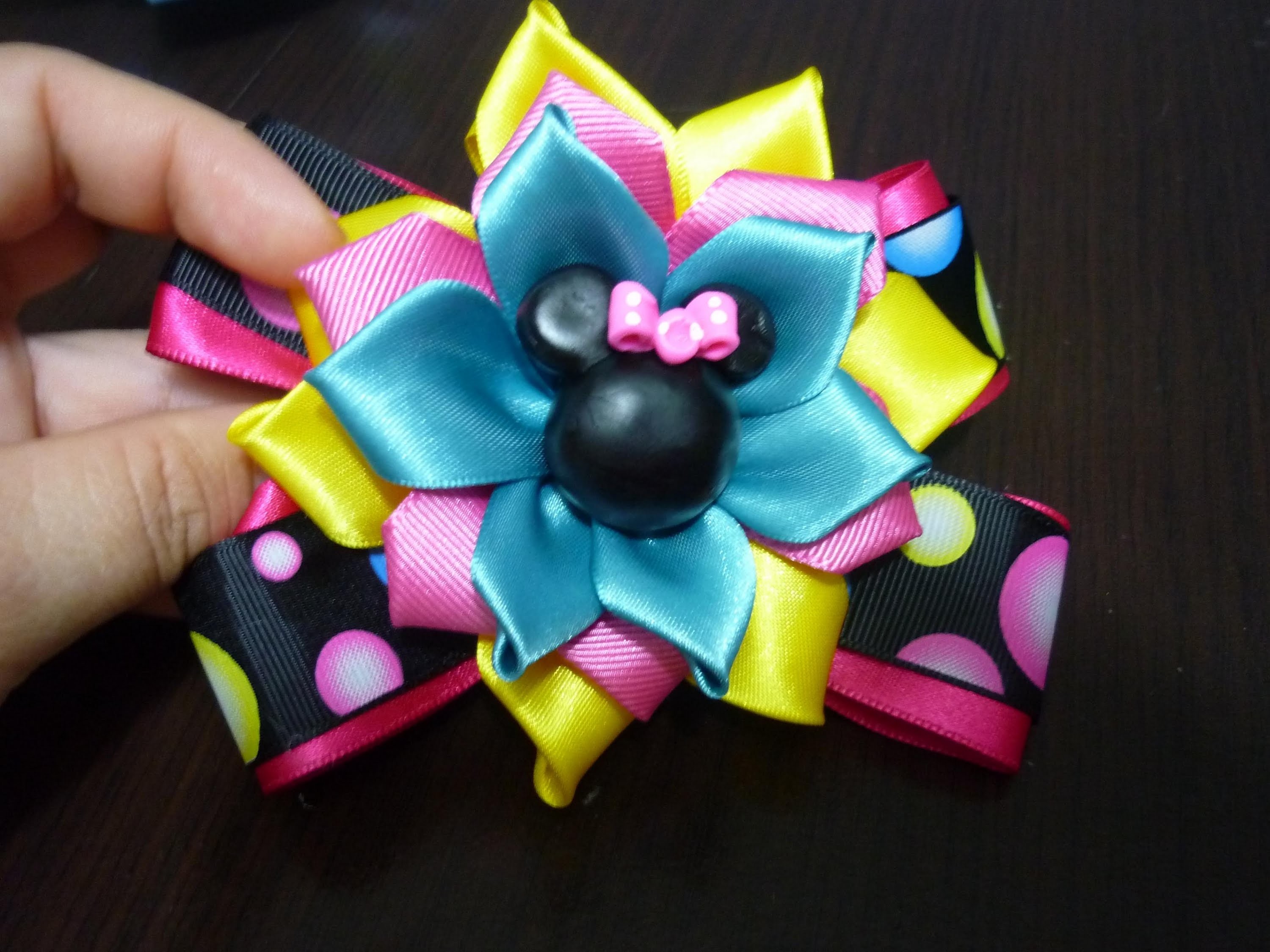 Tutoriales moños y flores en cina gros y raso para decorar peinados de