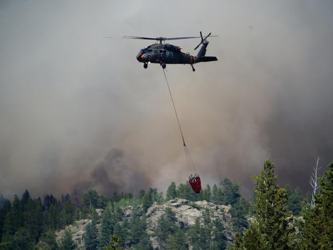 Mass evacuation as smouldering campfire sparks Boulder, Colorado blaze