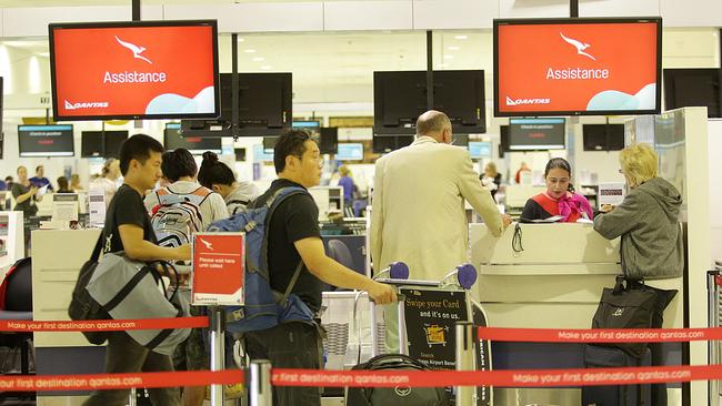 ACCC watching as Qantas hikes change fees on overseas flights The