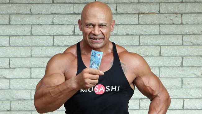 Australian strongman champion says he can live off 10 a week while