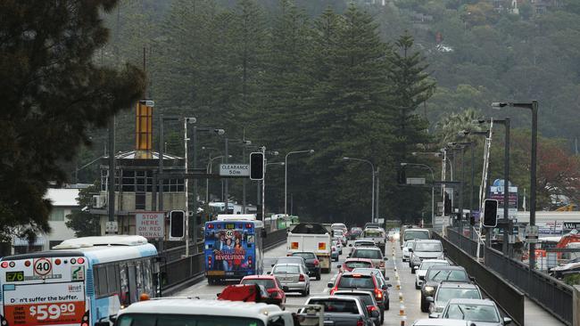 Sydney traffic crawls and Sydney buses diverted after burst water main