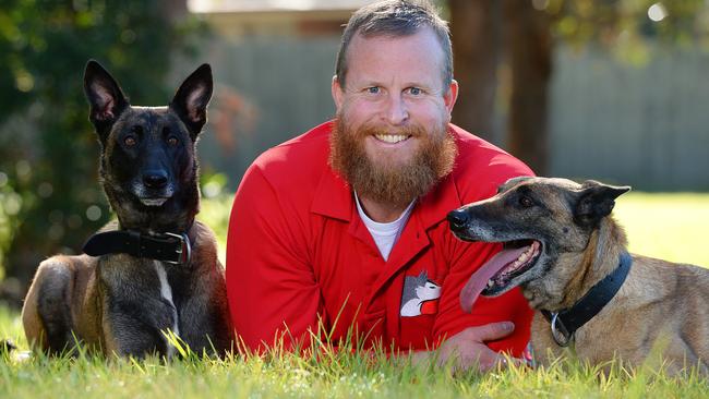 Dog trainer Brad Griggs teaching dogs in French and German Leader