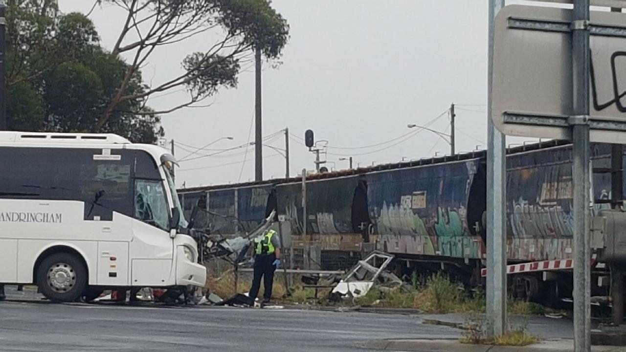 North Shore bus crashes into train infrastructure, leaving two injured