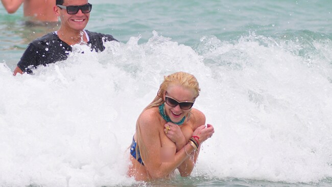Lindsay Lohan loses her bikini top at Miami Beach, exposes breast