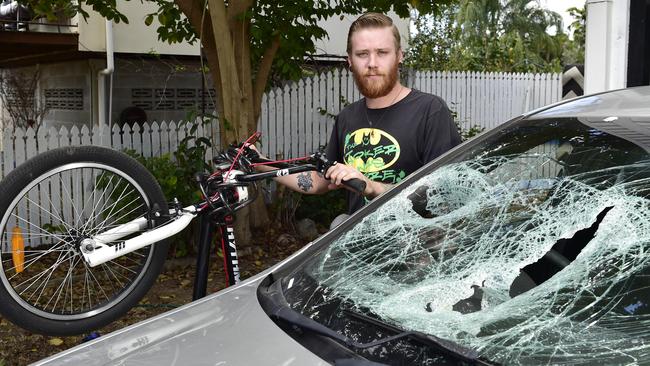 'He threw his bike through my windscreen' Herald Sun