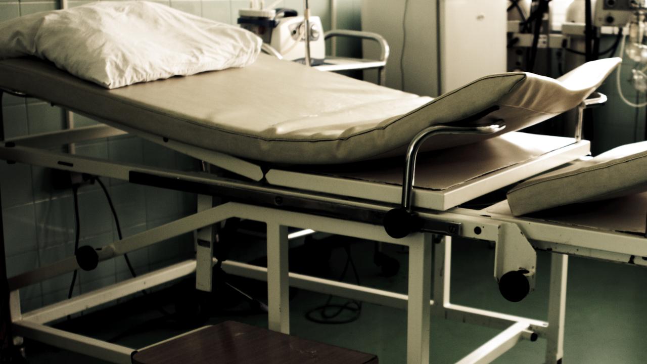 Nurse pulls head off baby during feet first delivery, hides body from