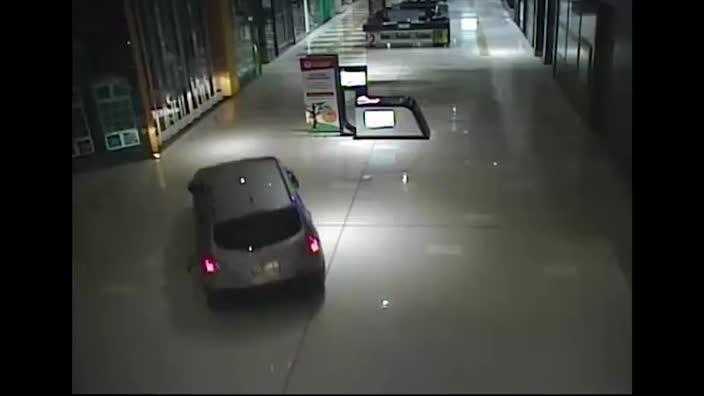 Thugs crash car through Westfield South Morang shopping centre Herald Sun