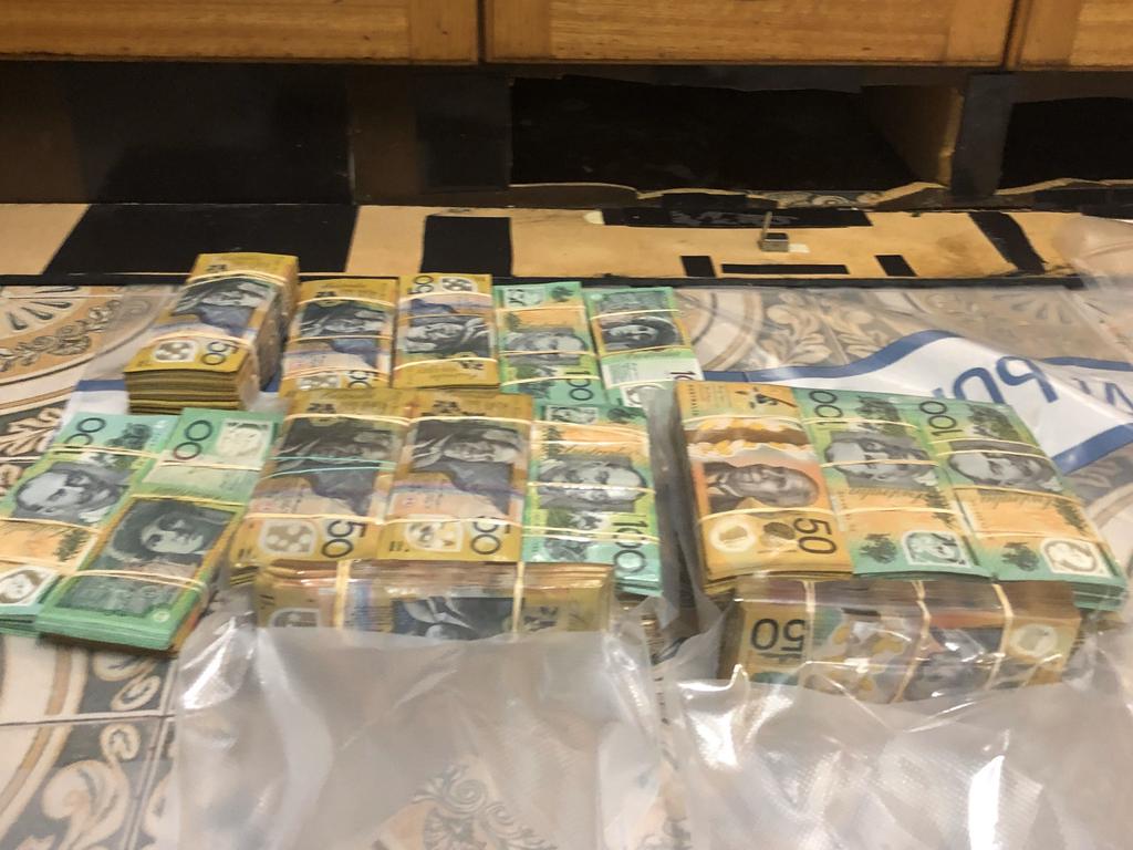 Operation Ironside AN0M sniffer dog finds cocaine, 100,000 in kitchen