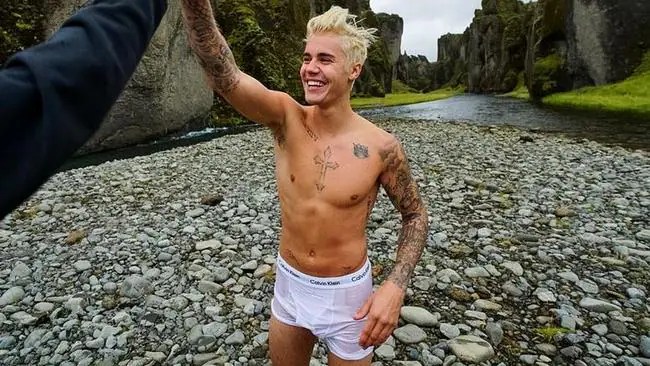 Justin Bieber naked photos: Bora Bora swimming pool dip pictures go viral